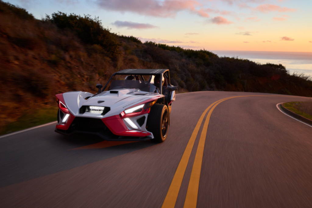 polaris sling shot driving down pacific coast highway near monterey